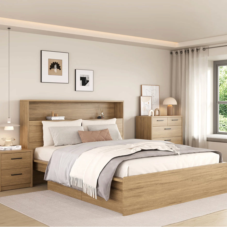 Image of warm, beige-toned bedroom, with Proferlo wooden furniture, a bedside table with a pendant light, a set of drawers and art on the walls.