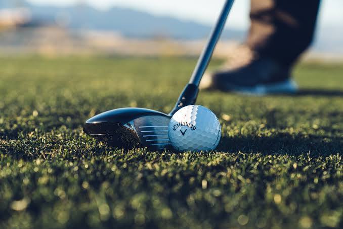 Image of a Golf club and ball